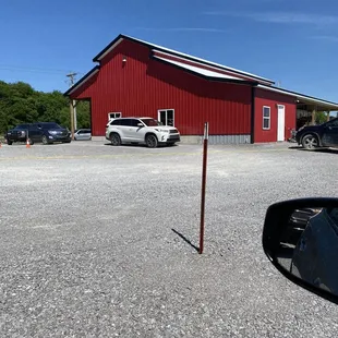 The line of cars to order circles around the building.