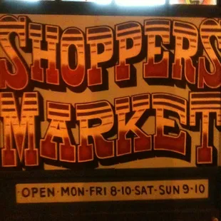 a sign in front of a window