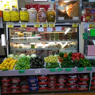 a fruit and vegetable display in a grocery store