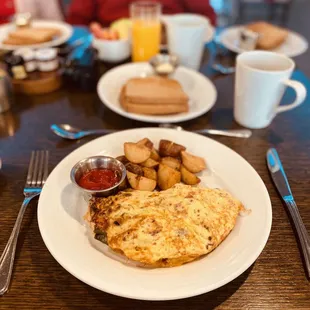 an omelet and potatoes