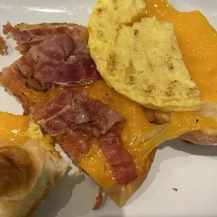 Gross cheap egg, cruddy limp bacon panini crousant