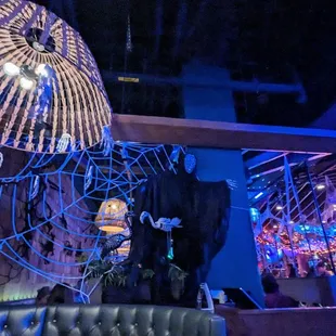 the interior of a restaurant decorated for halloween