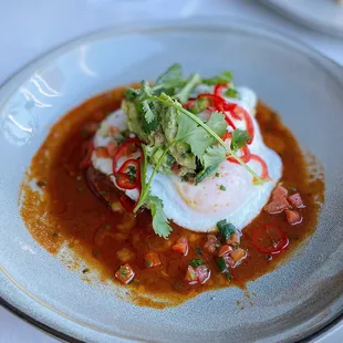 Carne adovada y huevos / $16