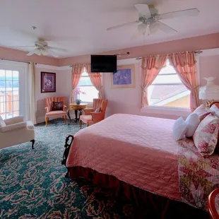 Pink Palace suite with balcony and water views