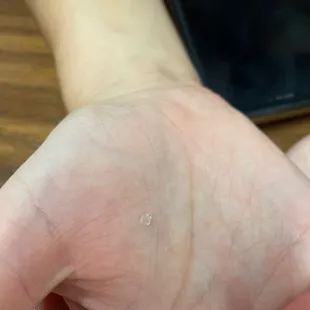 Piece of glass we found in our drink
