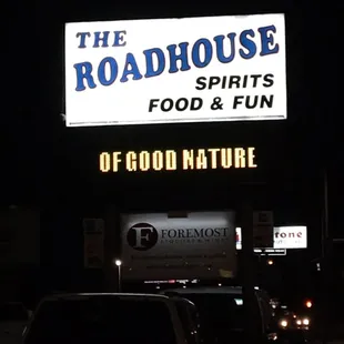 the roadhouse sign at night