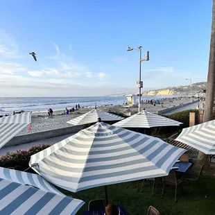 tables and umbrellas on the beach