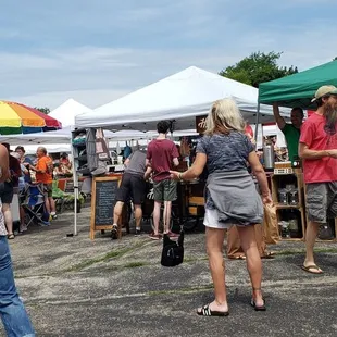 a crowd of people shopping