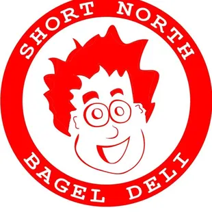 a man with glasses and a red wig