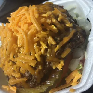 burger without the bun with cheddar cheese and extra onions and lettuce. Perfectly seasoned and perfect burger thickness!