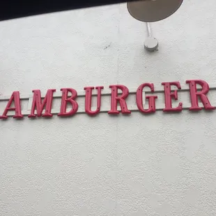the word hamburger on the side of a building
