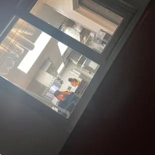 The lady that keeps giving us rude looks out of the window.