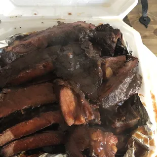 ribs in a styrofoam container