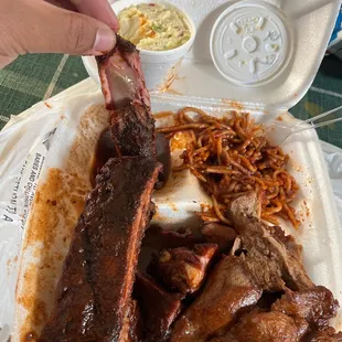 I'm definitely coming bk to this place first time and first bite of ribs it's a clean one to the bone. Spaghetti is fire potatoe salad