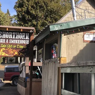 a sign for shorthorn bar and smokehouse