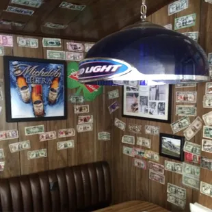 Funky atmosphere.. Covered with signed dollar bills from customers.