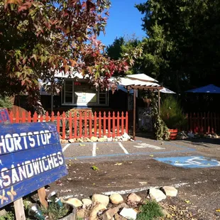 a sign in front of a restaurant