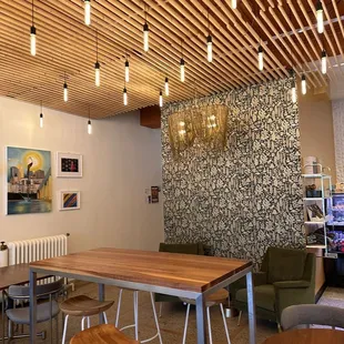 a table and chairs in a coffee shop