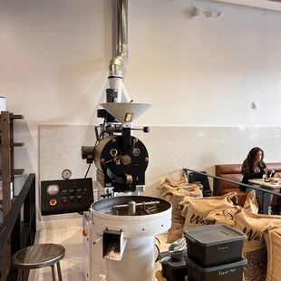 a coffee roaster in a coffee shop