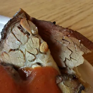 Grain showing how incredibly tender the brisket meat really is.