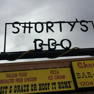 Ironwork above front entrance.
