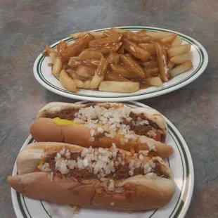 two hot dogs and french fries
