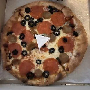 Personal pepperoni, sausage and black olive