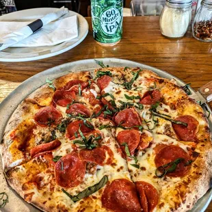 My own pizza... pepperoni, Italian sausage, roasted tomatoes,, basil. Wonderful.