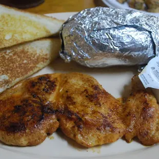 grilled chicken, toast, and a sandwich