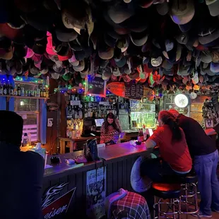 people sitting at the bar