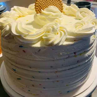 3 layer Confetti Cake w/fresh from scratch whipped topping Icing