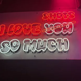 a neon sign that says i love you so much