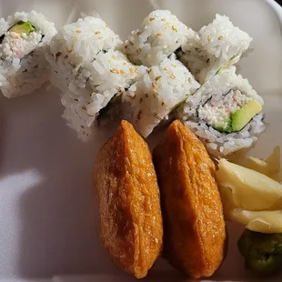 Yummy California roll (one piece gone) and even more yummy inari.( not shown yummy tamago.).