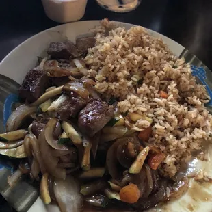Steak hibachi with onions, zucchini &amp; fried rice