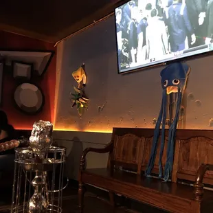 Enjoying the VIP section of Shots Orlando #MarchMadness (Side note: check out how fun their props are on the wall!)