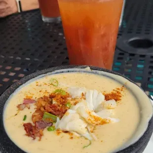 Cream of crab soup and Bloody Mary