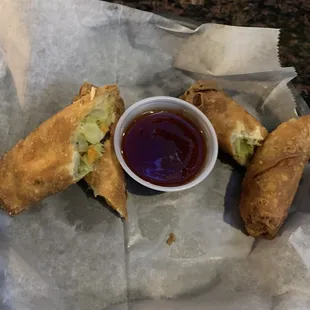 Egg rolls with sweet chili sauce.