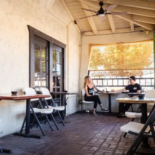 two people sitting at a table