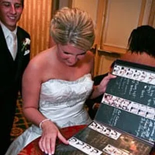 Bride looking at her album