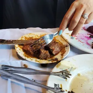 Remnants of filet mignon and spicy top sirloin