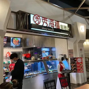 I love the back alley look of this food court!