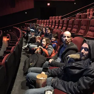 Family night at the movies, and they have beer and wine.
