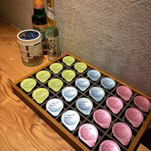 Fancy mouthwash and toothpicks in the restroom