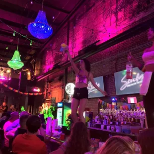 Bartenders dancing on bar and pouring shots!!!