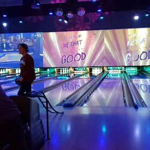 Music videos and sports playing on big screen.