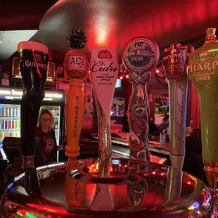 a bar with beer taps