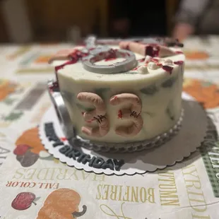 Custom Saw birthday cake for a horror loving man child! Pumpkin cake with orange blossom buttercream.