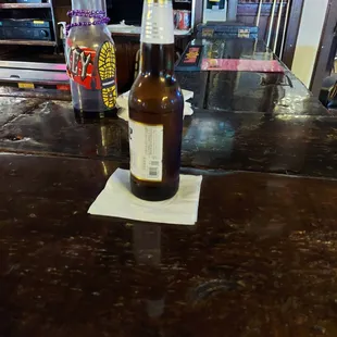 a bottle of beer on a table