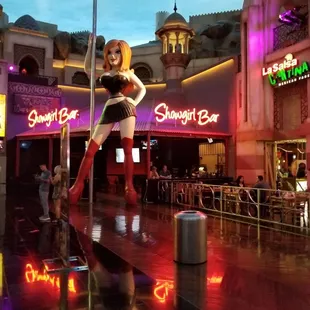 a woman dancing in the rain