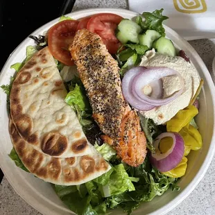 Mediterranean hummus salad with salmon